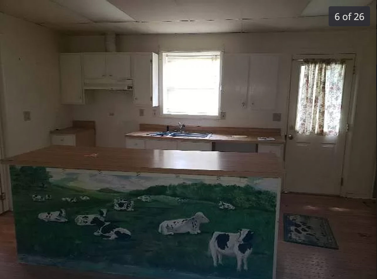 cows painted on a kitchen island